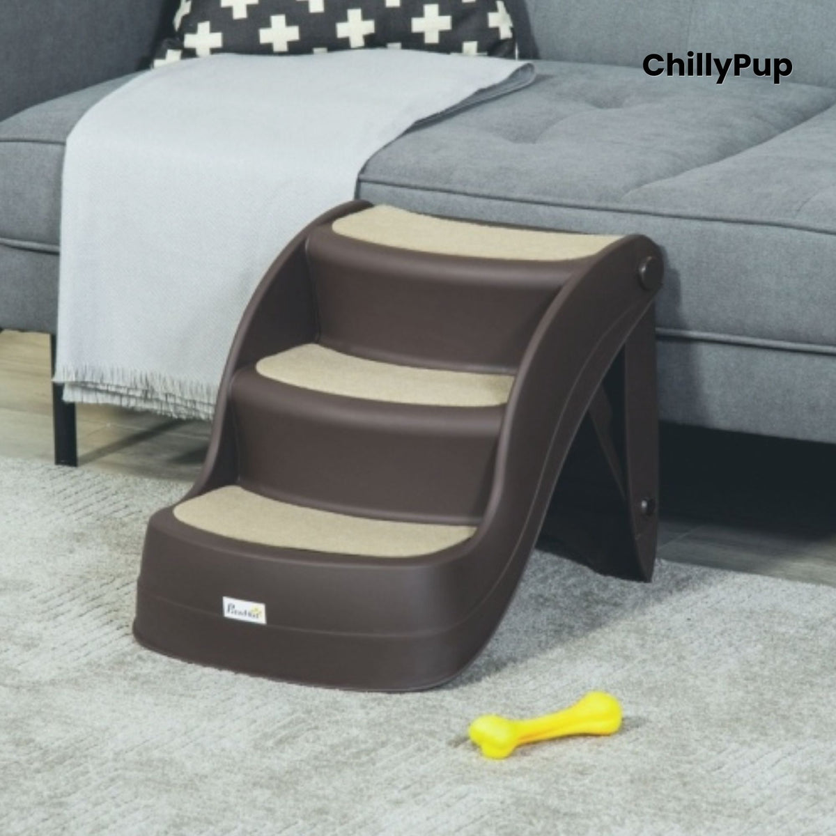 Pet steps with 'ChillyPup' branding in front of a grey sofa.