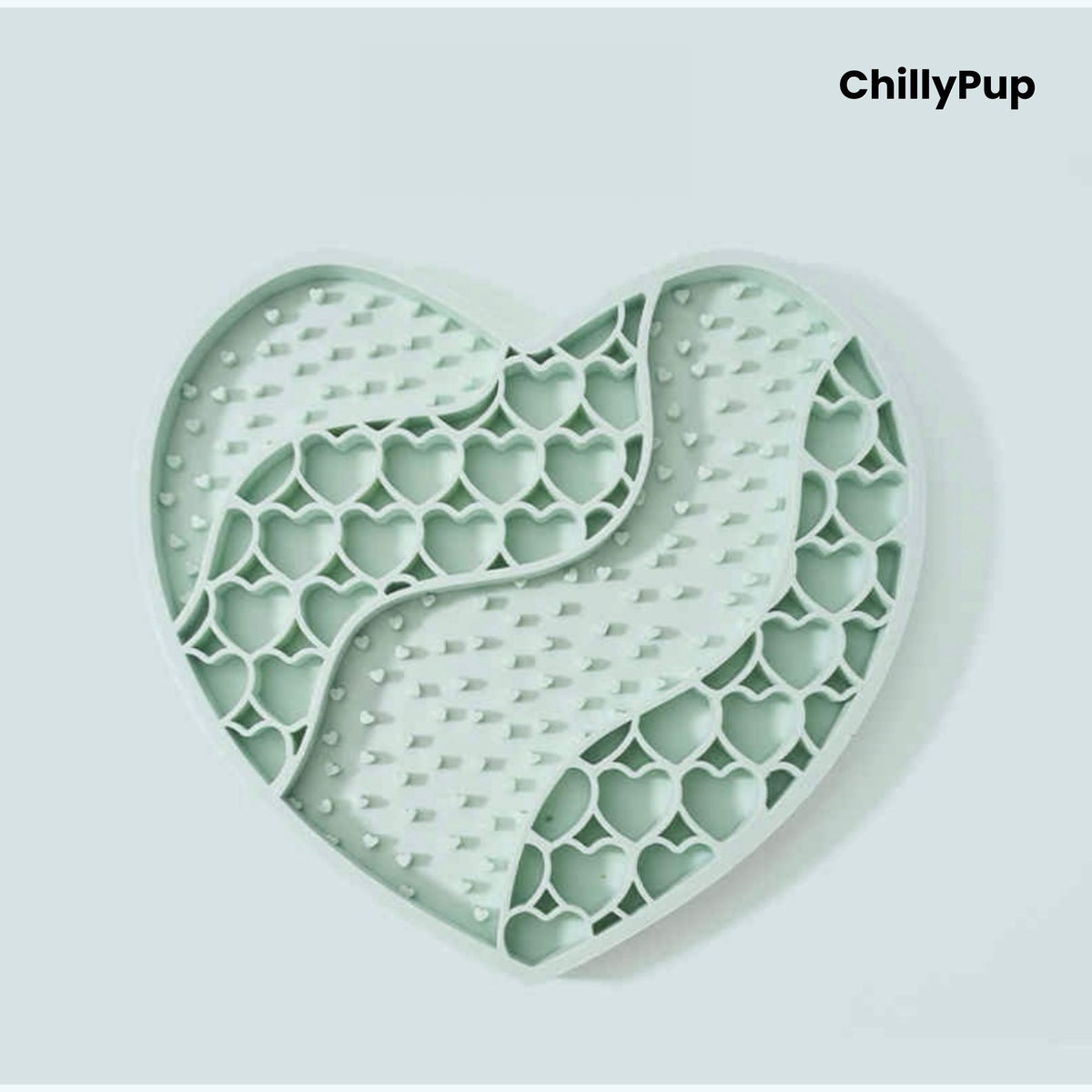 Heart-shaped purple dog lick mat with textured surface on a light gray background, branded 'ChillyPup'.