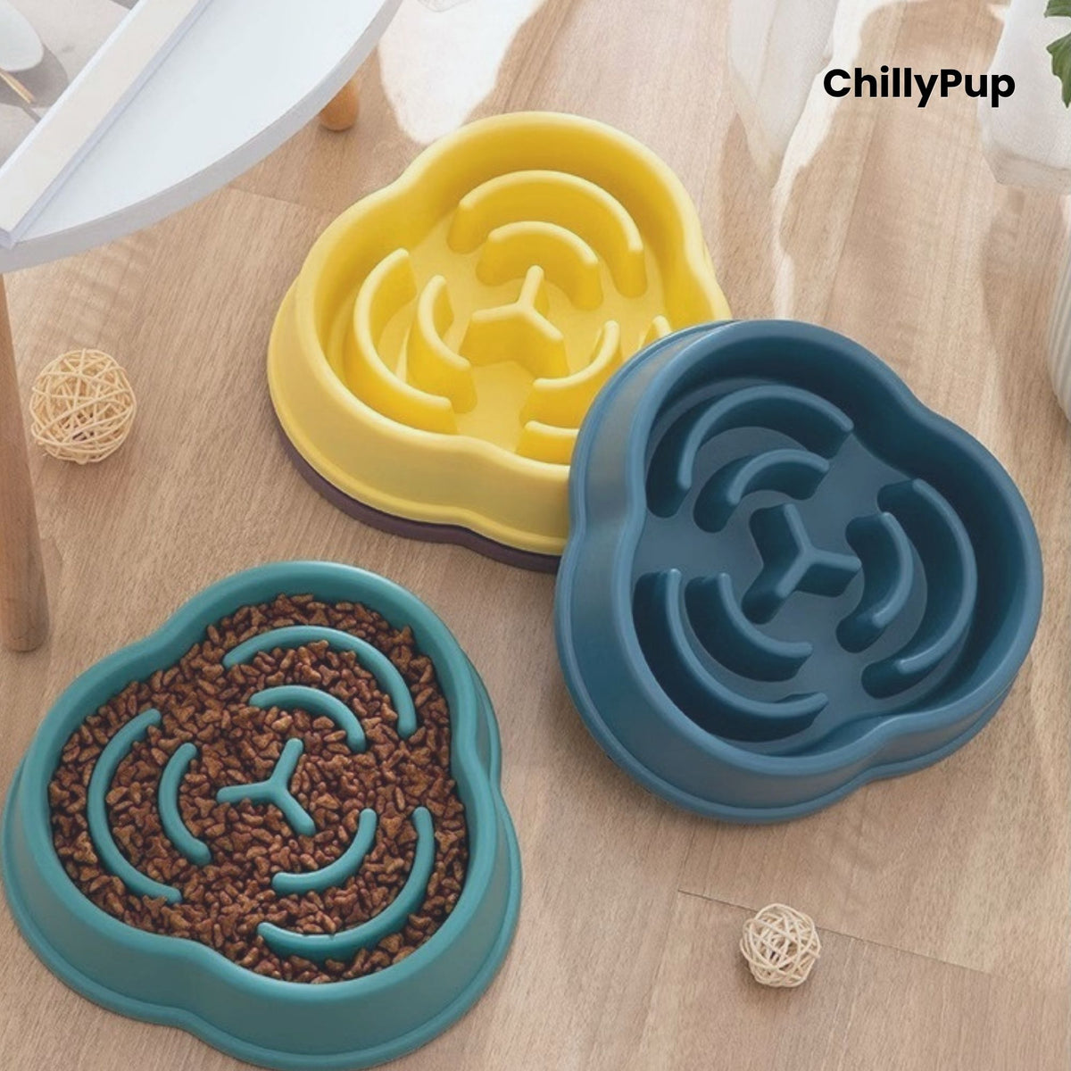 Three pet bowls with maze design on a wooden surface, branded 'ChillyPup'.