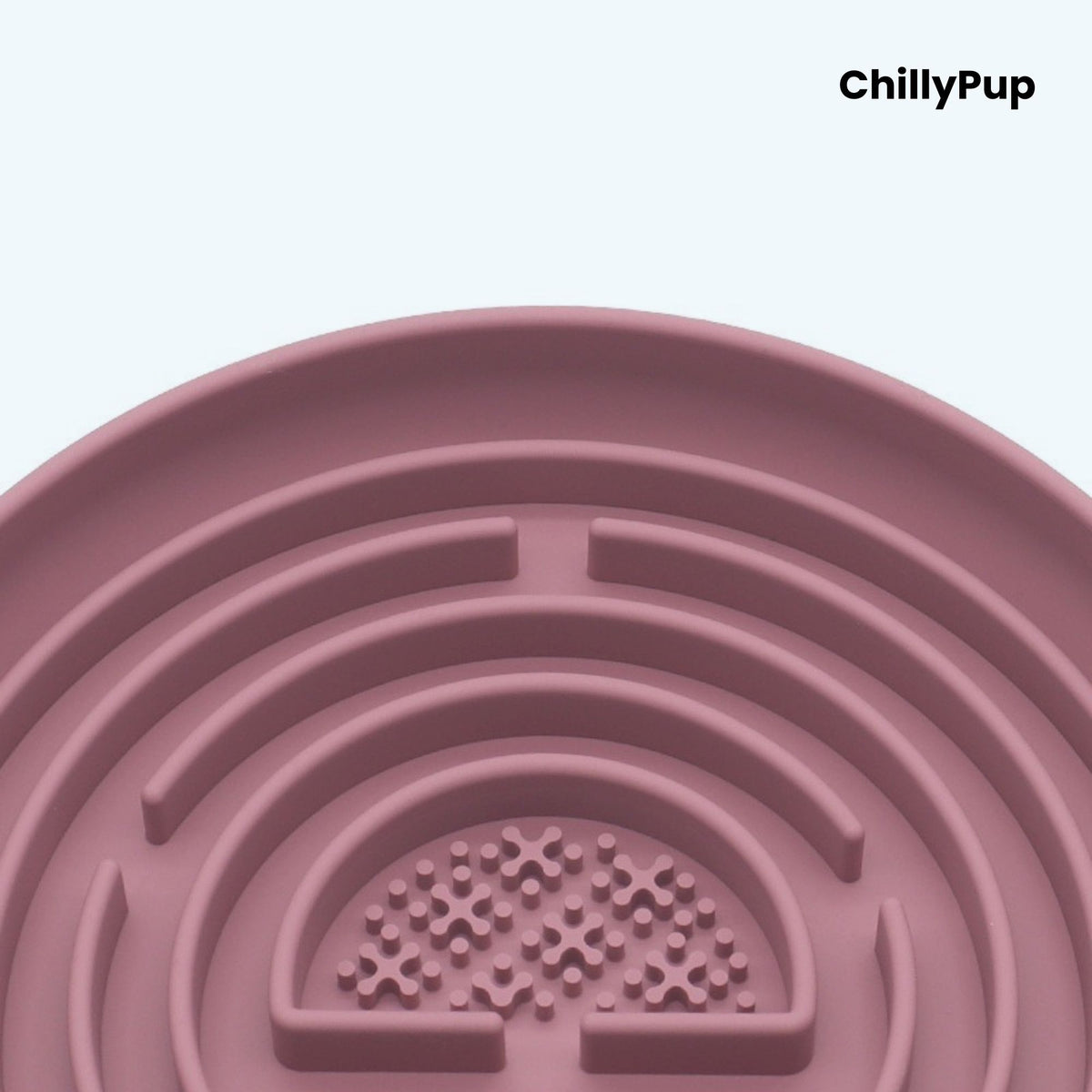 Pink pet bowl with maze design on a light purple background, branded 'ChillyPup'.