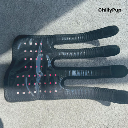 A black redlight leg wrap facing upwards on a carpet with ChillyPup branding.