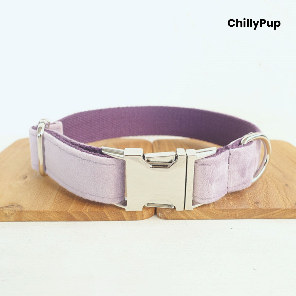 Lavender dog collar on a wooden board with 'ChillyPup' branding.